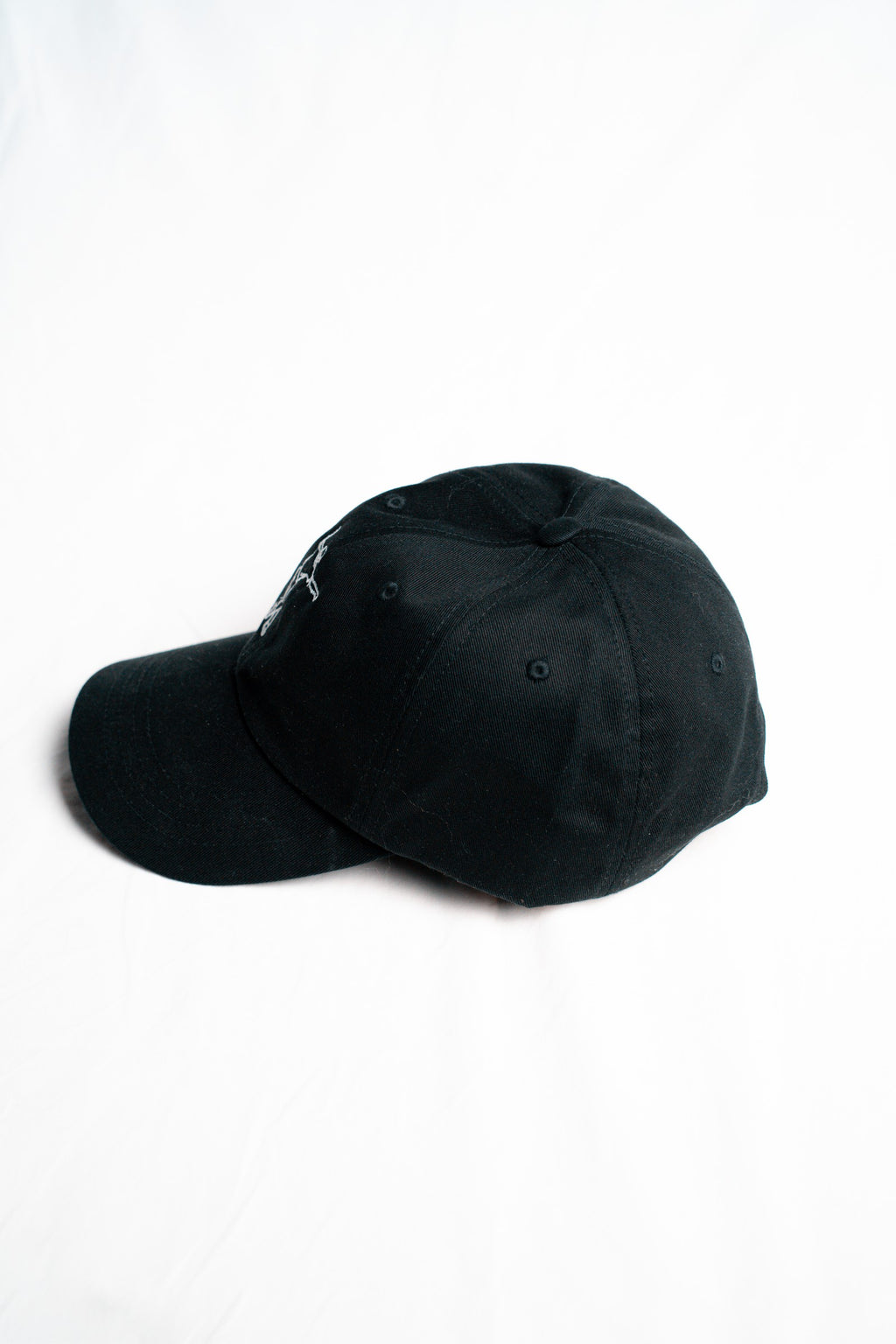 FOA black cap, side view.