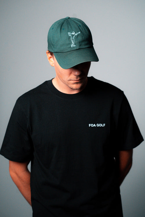 FOA green cap, worn on a model.