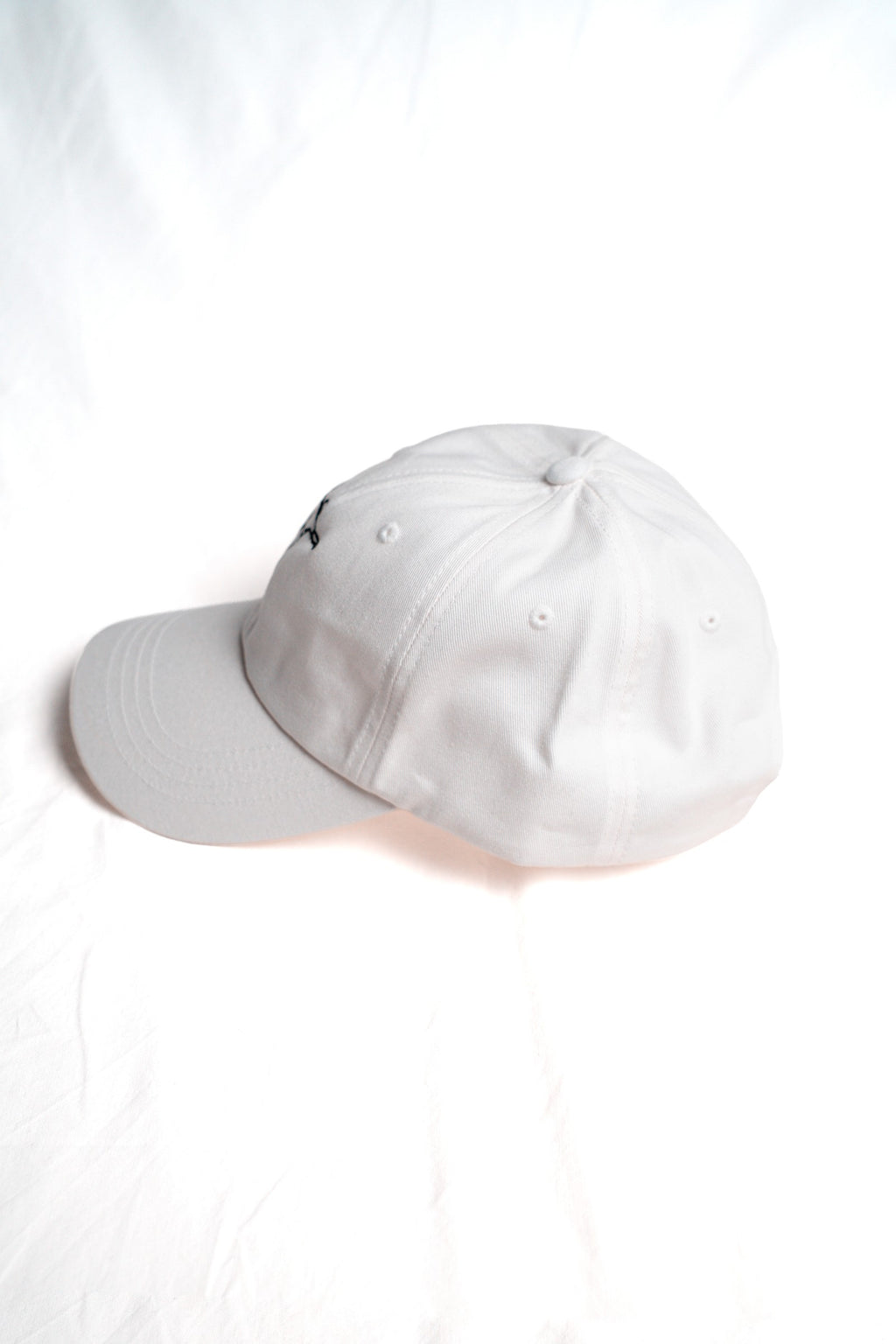 FOA white cap, side view.