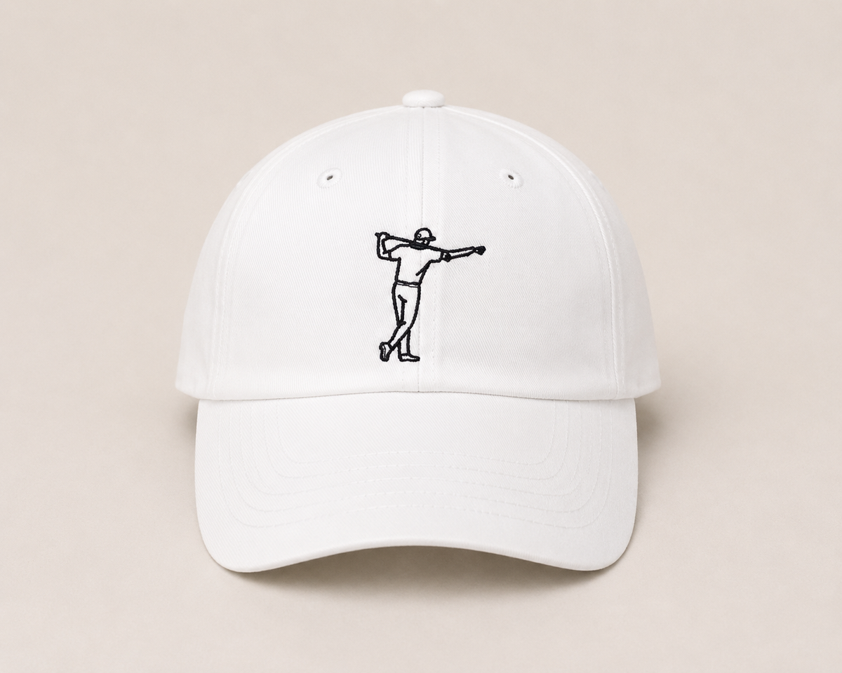 Vit golfkeps från FOA Golf med broderad golfare framtill