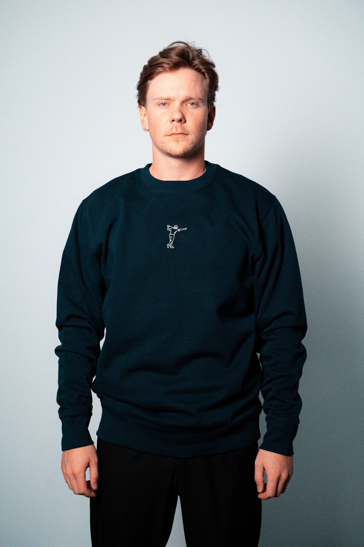 FOA navy sweatshirt, front view worn on a model.