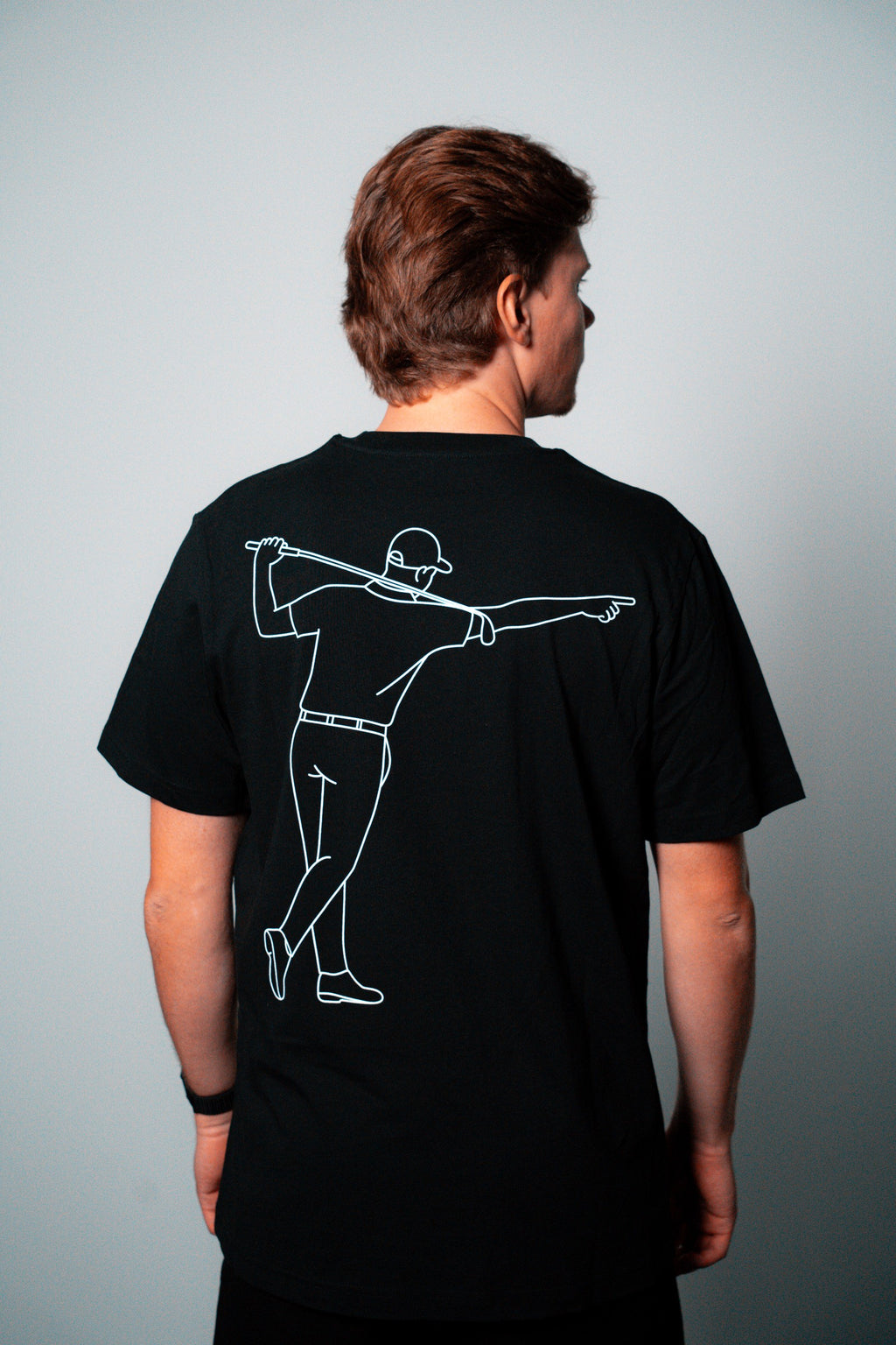 FOA black t-shirt, back view worn on a model.